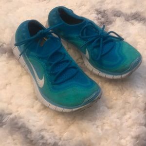 Blue Nike fly knit sneakers 5.0. MAKE AN OFFER